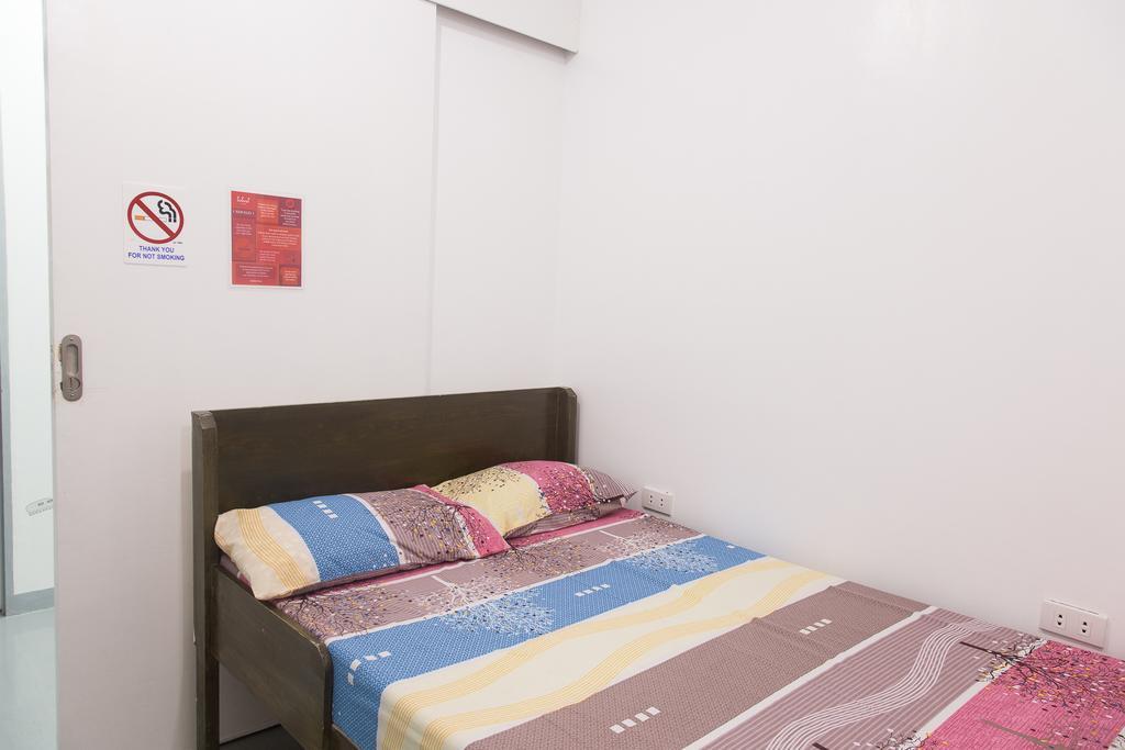 Lokal Hostel San Pedro Makati Værelse billede