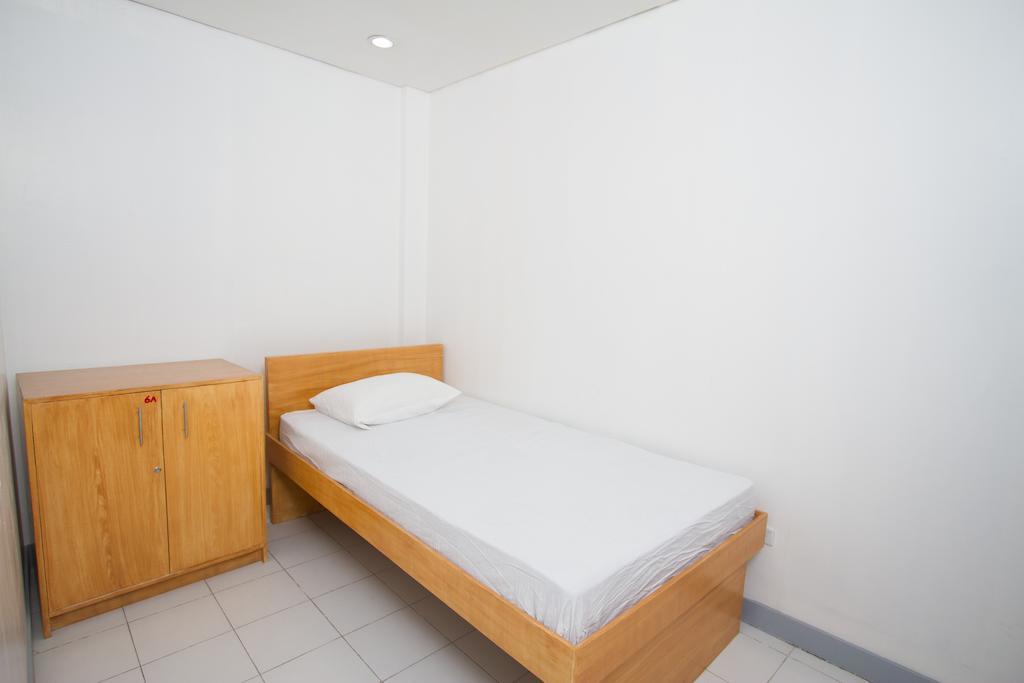 Lokal Hostel San Pedro Makati Værelse billede