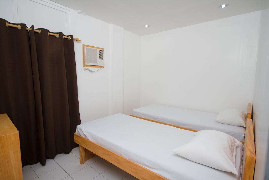 Lokal Hostel San Pedro Makati Værelse billede
